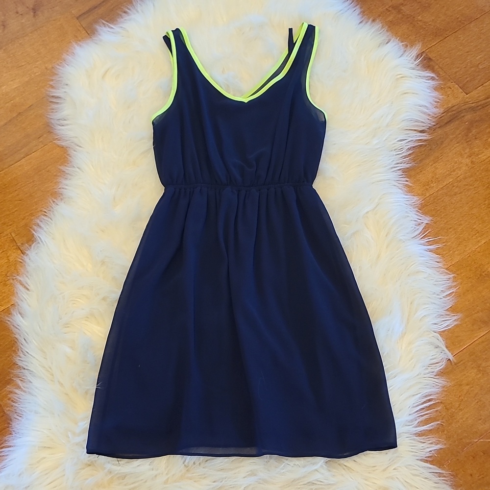 Navy dress with neon green piping.